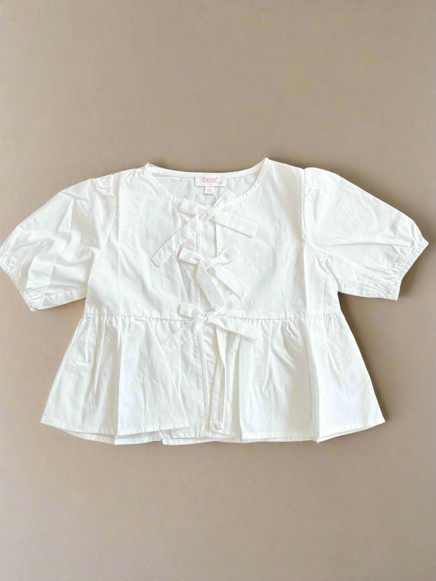 PRETTY IN PEPLUM TOP