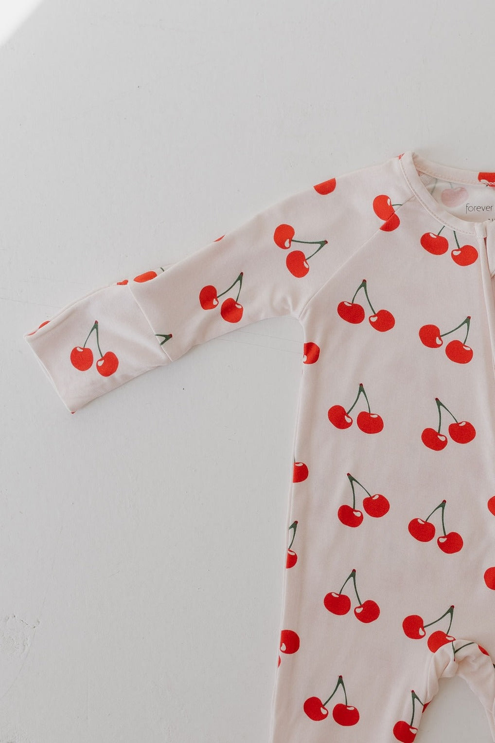 SWEET AS A CHERRY BAMBOO ZIP ROMPER