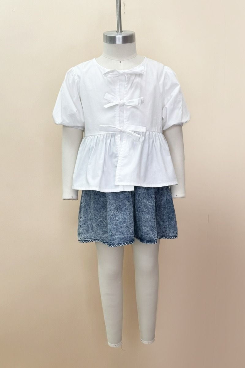 PRETTY IN PEPLUM TOP