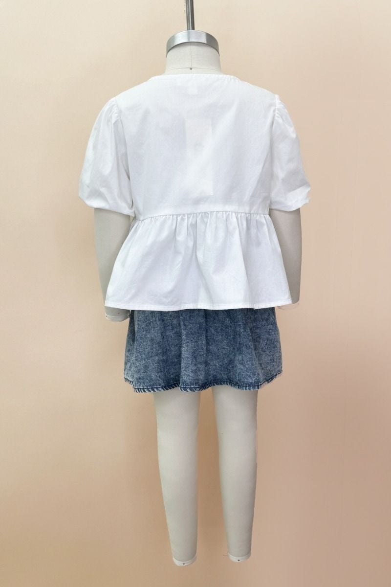 PRETTY IN PEPLUM TOP