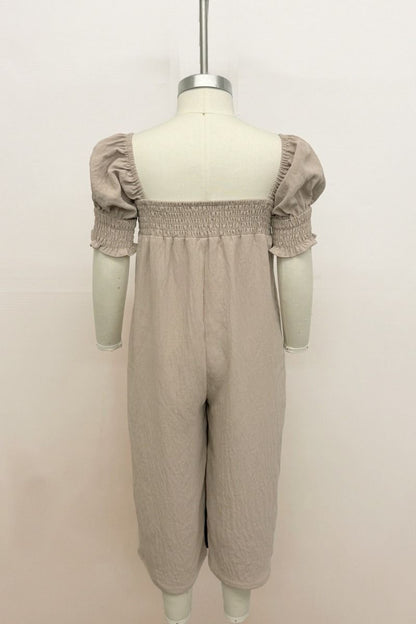 SUGAR AND SPICE SMOCKED JUMPSUIT