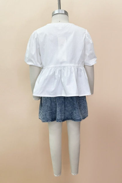 PRETTY IN PEPLUM TOP
